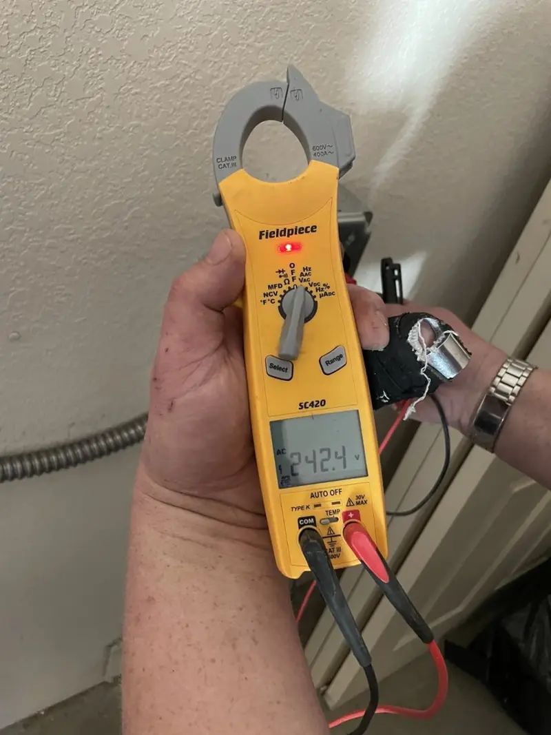 Voltage testing with clamp meter during Circuit Breaker Repair in Levelland